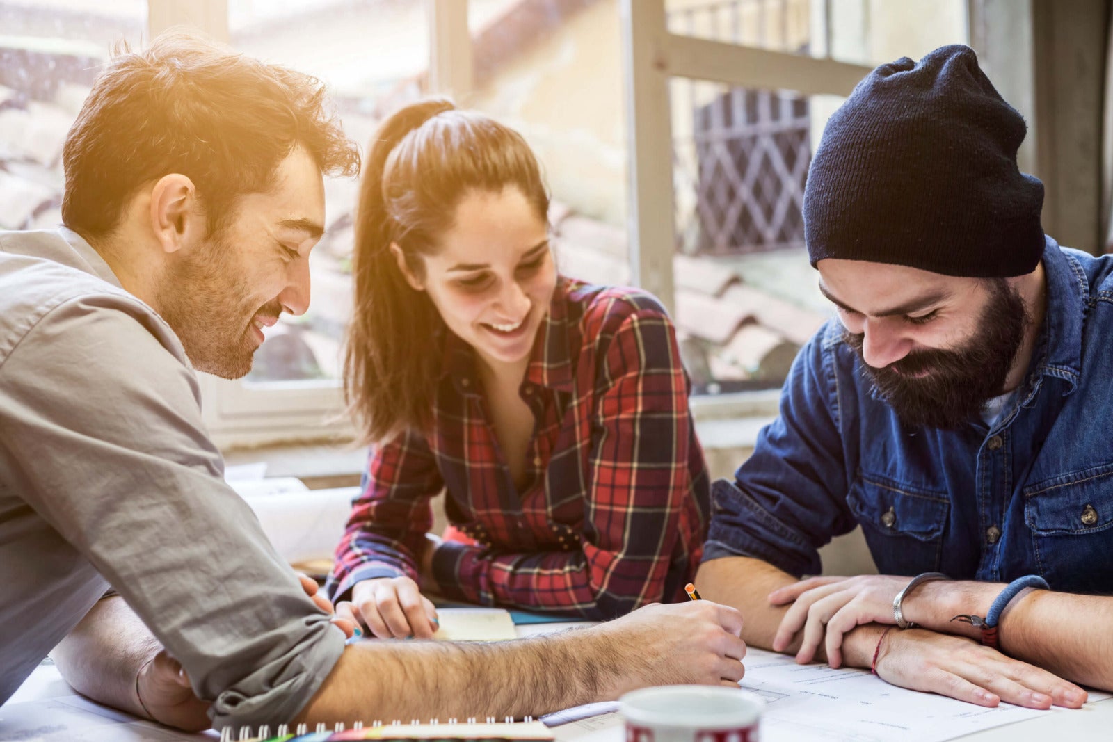 small business colleagues work at office table